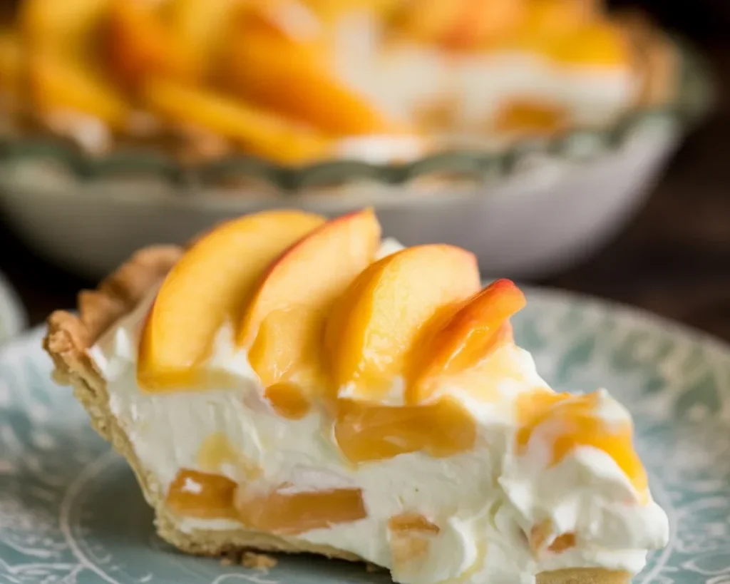Delicious Peaches and Cream Pie with flaky crust and creamy peach filling